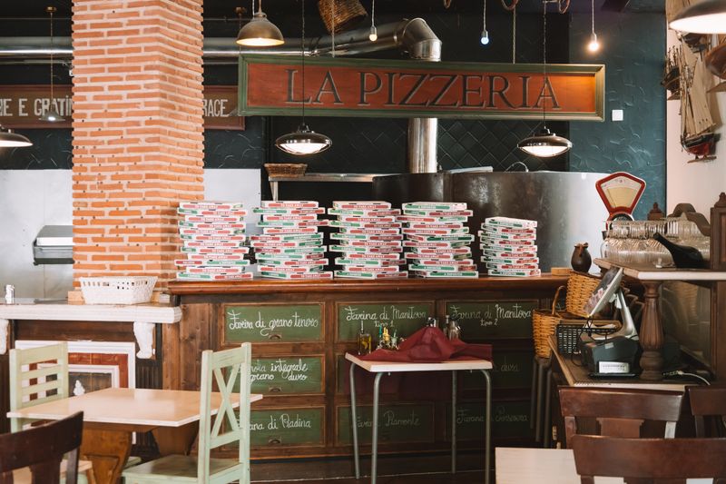 Green Lantern Pizza kitchen team crafting handmade pizzas