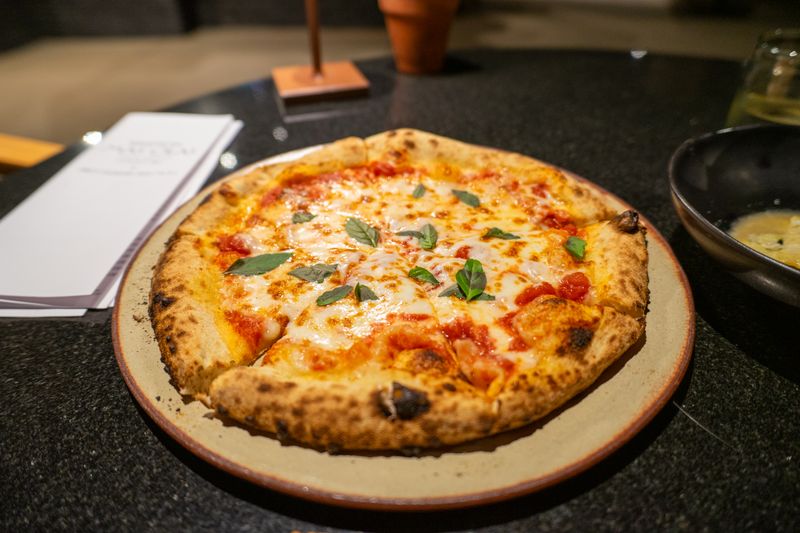 Artisan pepperoni pizza freshly baked at Green lantern pizza