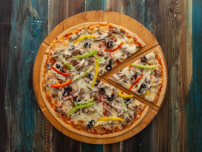 Veggie supreme pizza loaded with fresh garden vegetables