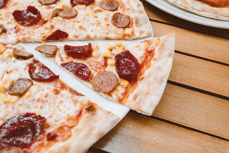 Truffle mushroom pizza with fresh rosemary and parmesan shavings